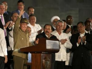 Cuban President Raul Castro acknowledges the applause from the crowd as Nicaragua's President Daniel Ortega (C), Cuba's First Vice President Miguel Diaz-Canel and Ecuadorean President Rafael Correa (R) applaud as they attend a massive tribute to Cuba's late President Fidel Castro in Revolution Square in Havana, Cuba, November 29, 2016. REUTERS/Carlos Garcia Rawlins